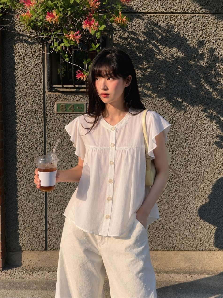 Camisa rayon poplin sin mangas con frunce y voladitos