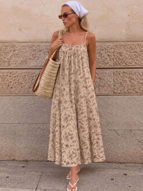 Vestido largo tira bretel de lino estampado con boton en la espal