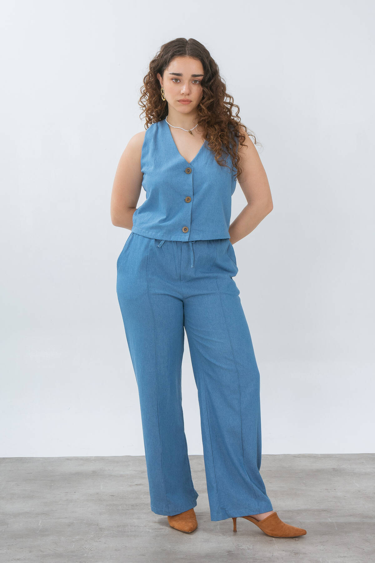 Palazo de denim con elástico tiras alforzas y bolsillos
