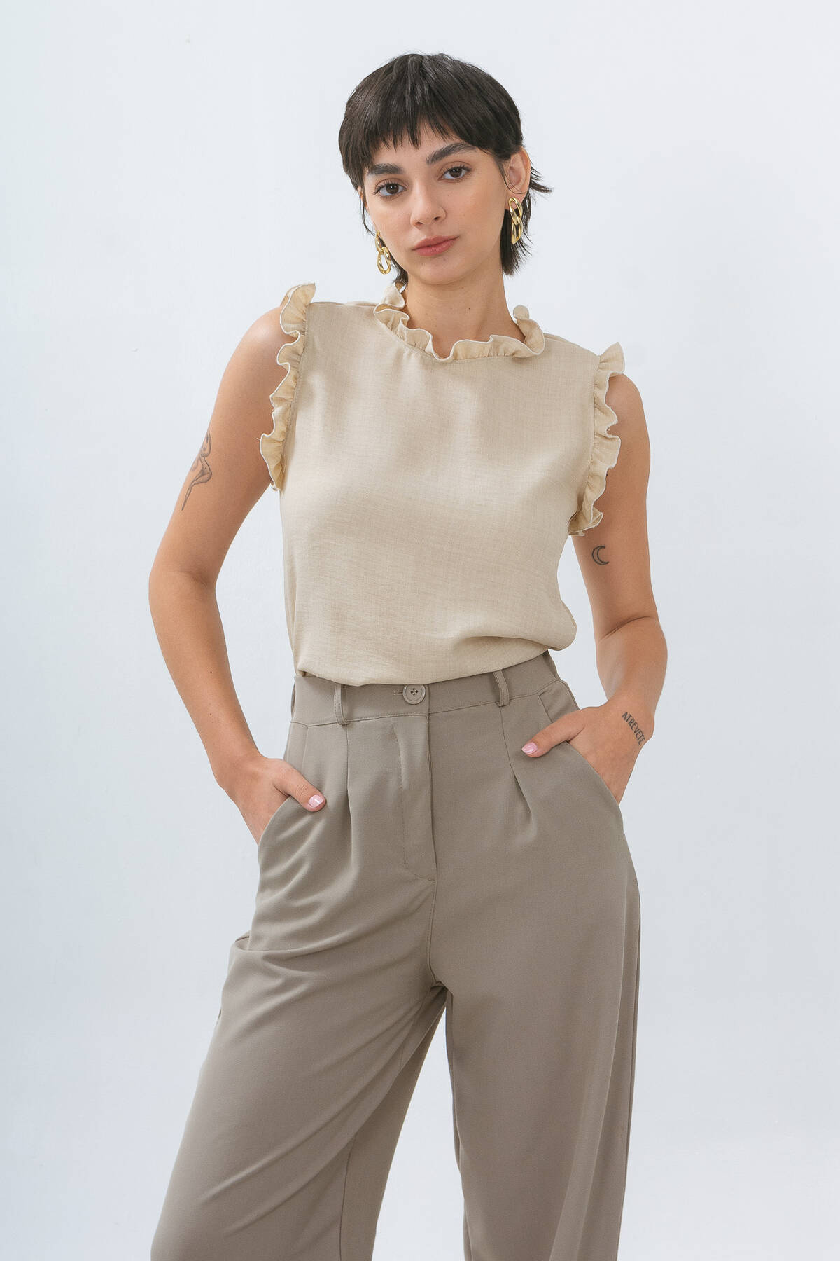 Musculosa de cey jean con volados lágrima y botón