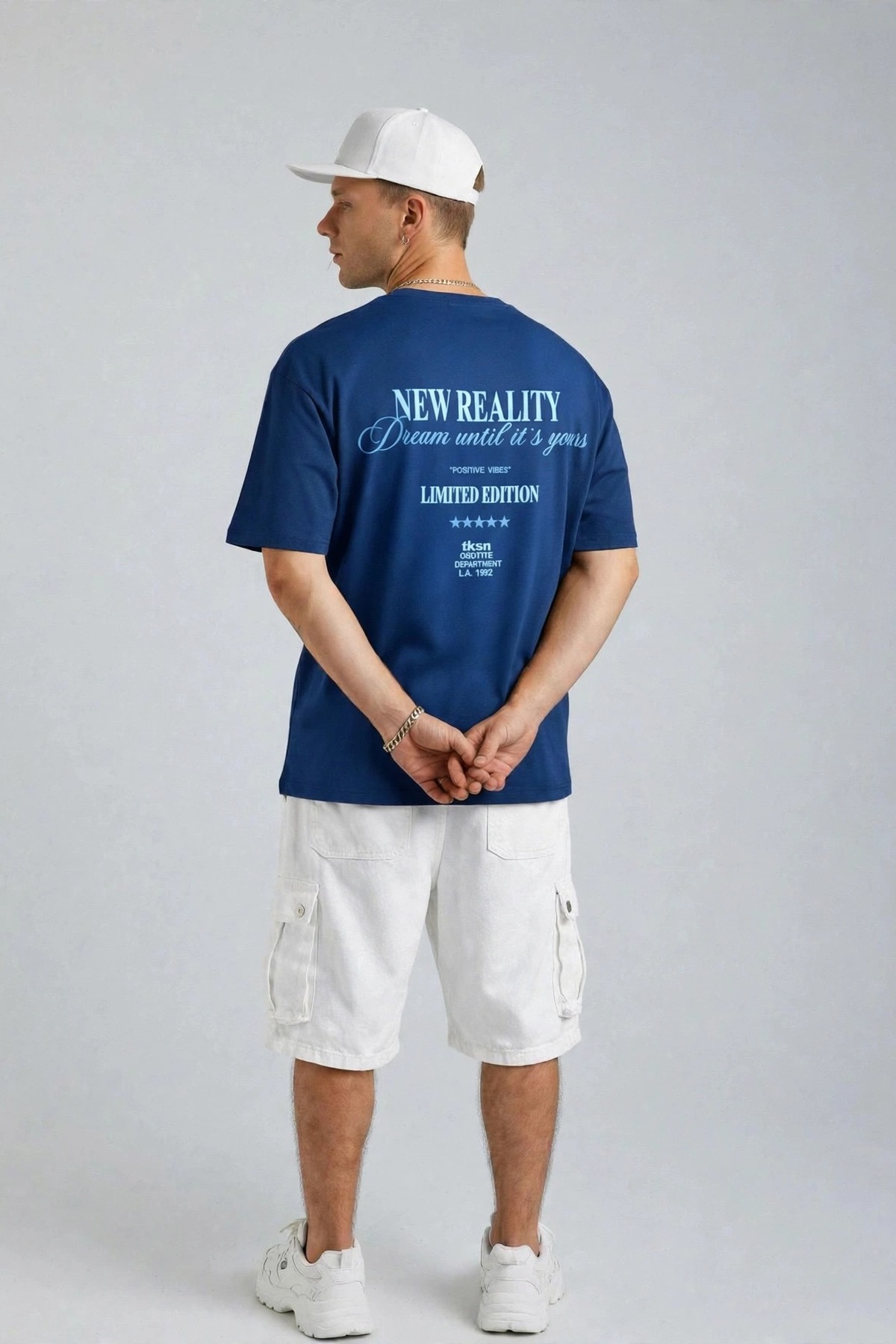 REMERA OVERSIZE NEW REALITY
