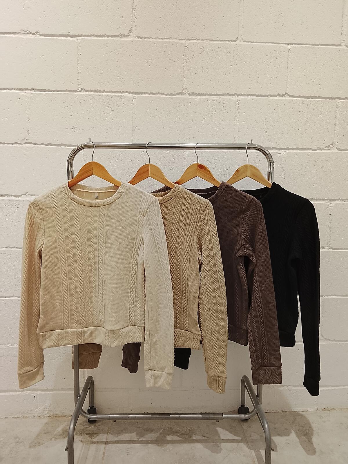 C607 Sweater con puño